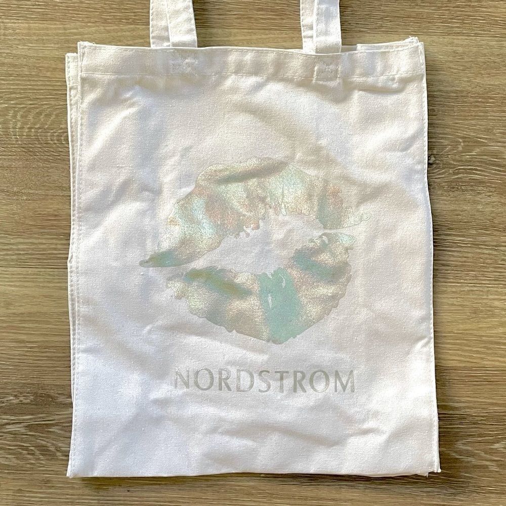Nordstrom white canvas bag with “kiss”
